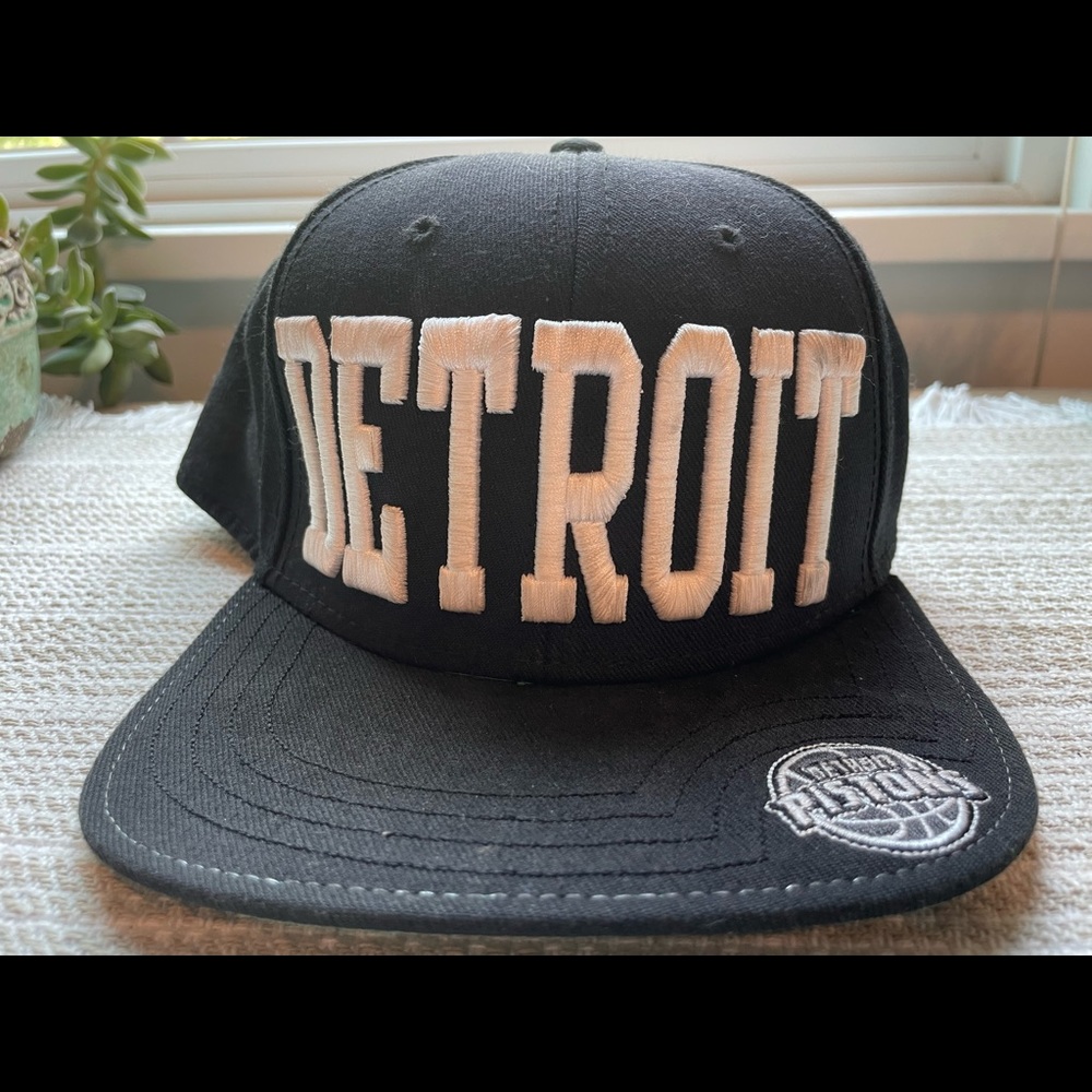 Detroit Pistons navy ball cap. Headwear by the Game. OSFM